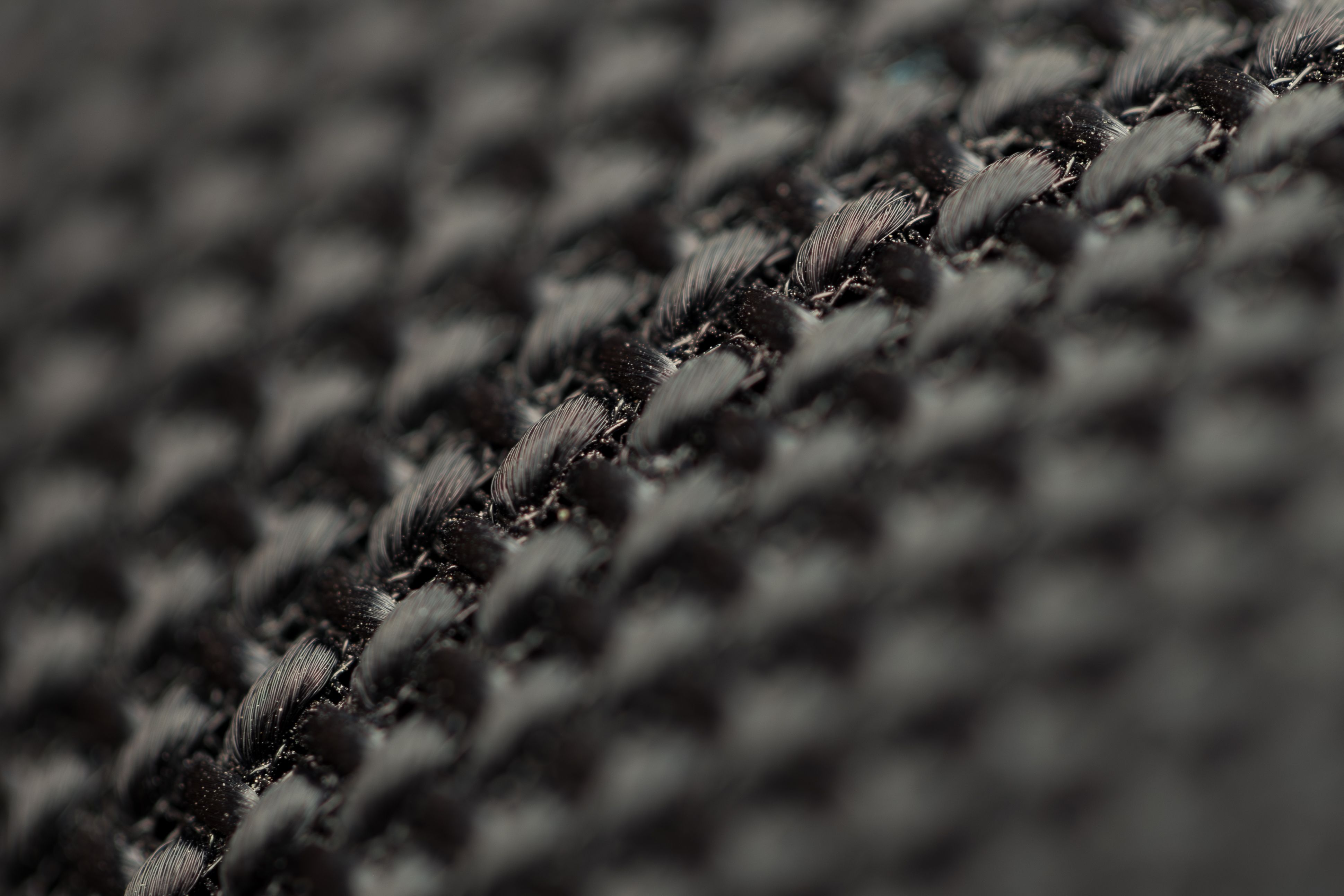 Black woven textile structure for bedding material engineering